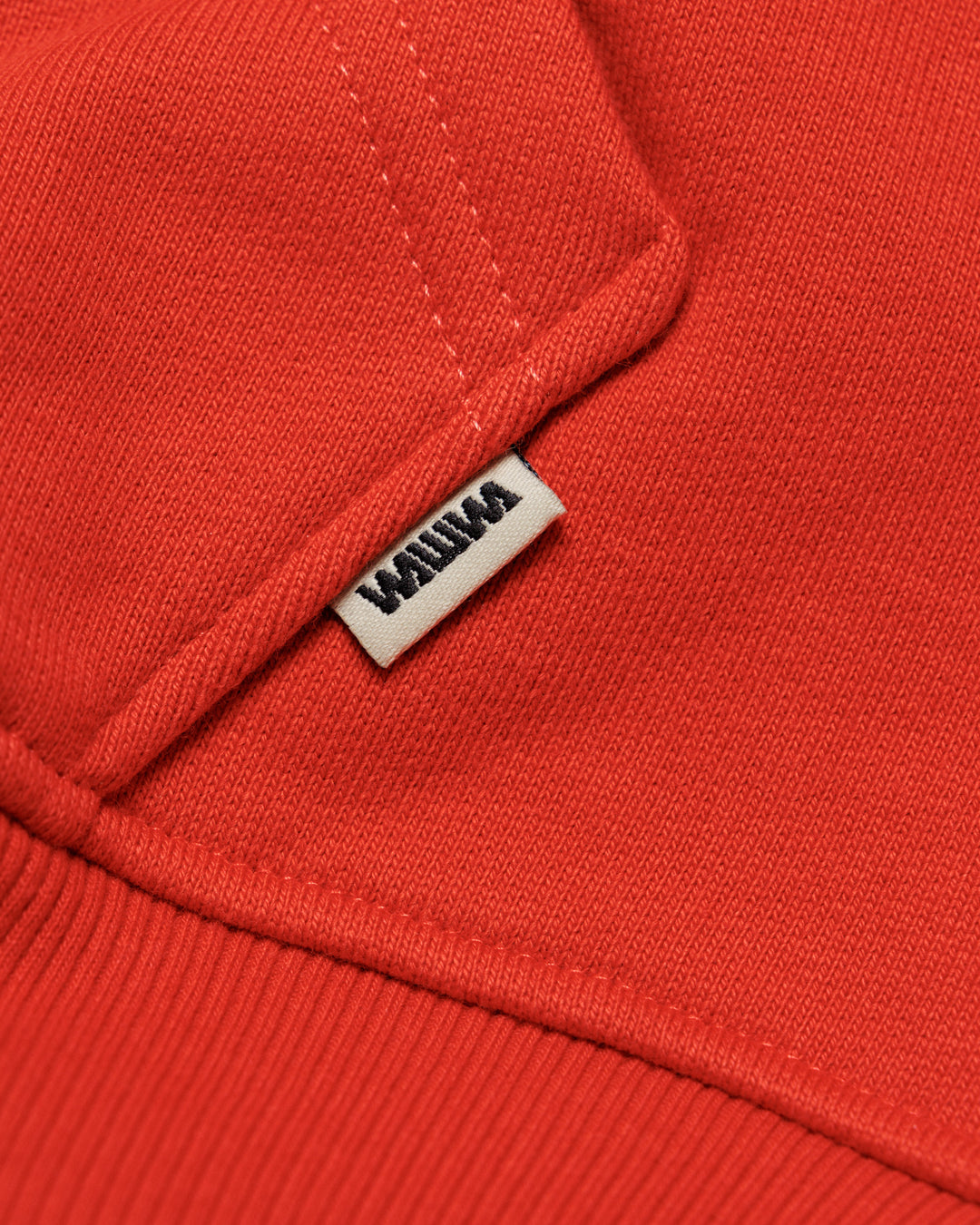 Heavyweight Two-Way Zip Hoody - Signal Red — Hem label branding detail