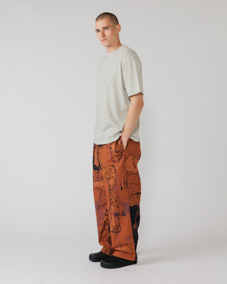 Water Resistant Zama Pants - Abstract Brick Camo — 3/4 angle, drape and pocket